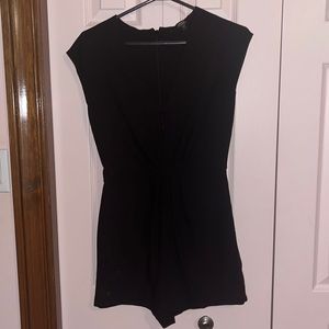 GUESS Women’s Black Romper. Low cut, V Neck. Size 4. Going out outfit. Clubwear